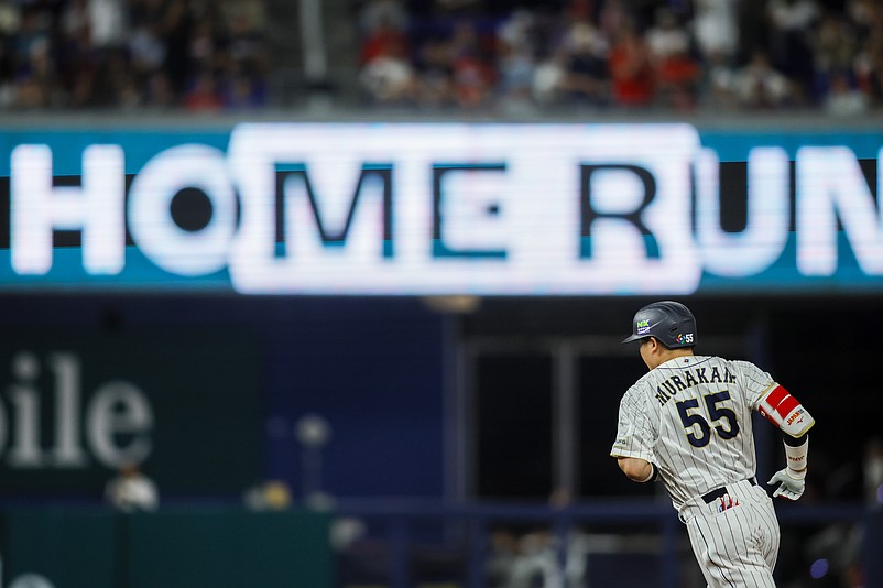 Mar 21, 2023; Miami, Florida, USA; Japan third baseman Munetaka Murakami (55) circles the bases after hitting a home run during the second inning against USA at LoanDepot Park. Mandatory Credit: Sam Navarro-USA TODAY Sports
