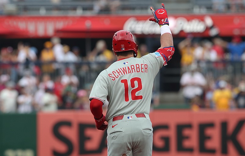 Jun 7, 2025; Pittsburgh, Pennsylvania, USA;  Philadelphia Phillies designated hitter Kyle Schwarber (12) gestures as he circles the bases on a solo home run against the Pittsburgh Pirates during the first inning at PNC Park. Mandatory Credit: Charles LeClaire-Imagn Images