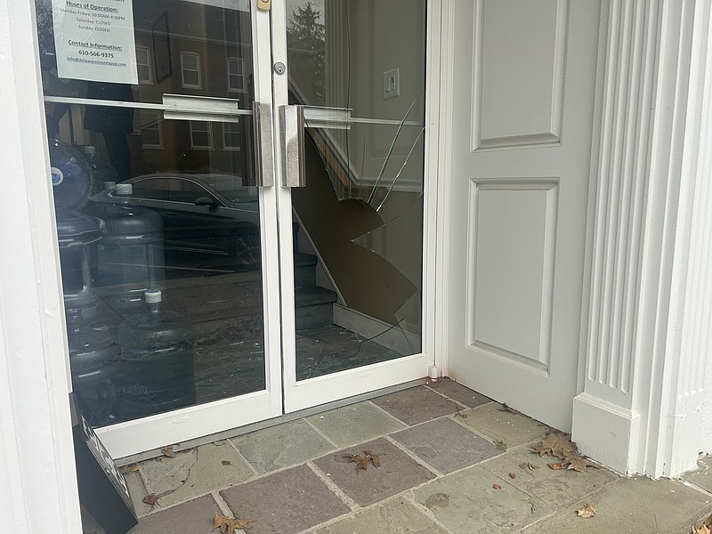 While the right-hand glass door was damaged at the Delaware County Republican Headquarters Wednesday morning, the left side remained intact. (Image by Olivia DeMarco)