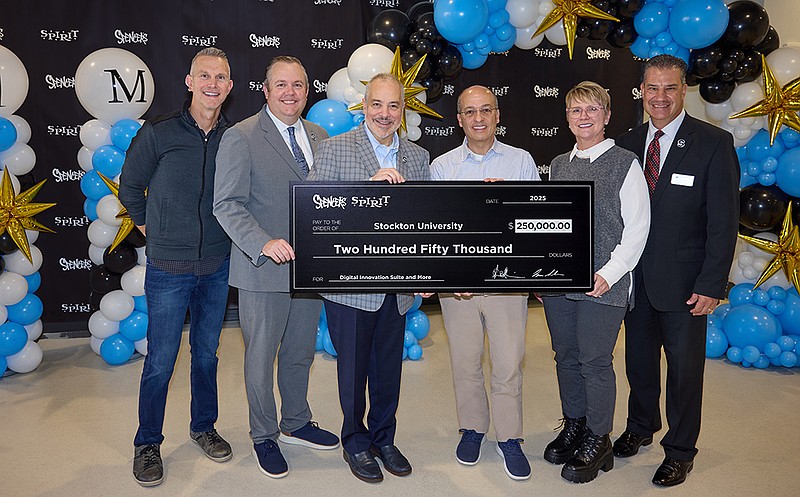 STOCKTON/From left, Darren Haviland, divisional vice president of Guest Services and Corporate Administration for Spencer’s and Spirit; Dan Nugent, executive director of the Stockton University Foundation; Stockton University President Joe Bertolino; Ike Silvera, president and COO of Spencer’s and Spirit; Mary Raddant, vice president of Human Resources for Spencer’s and Spirit; and Michael Palladino, Stockton provost and vice president for Academic Affairs.