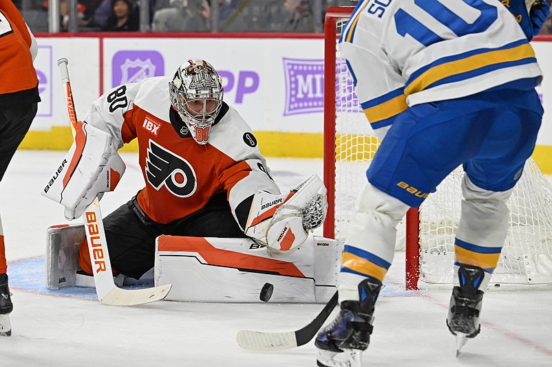 Nov 20, 2025; Philadelphia, Pennsylvania, USA; Philadelphia Flyers goaltender Dan Vladar (80) makes a save against St. Louis Blues center Brayden Schenn (10) during the second period at Xfinity Mobile Arena. Mandatory Credit: Eric Hartline-Imagn Images