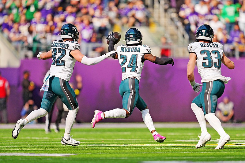 Oct 19, 2025; Minneapolis, Minnesota, USA; Philadelphia Eagles safety Andrew Mukuba (24) celebrates after making an interception during the second half against the Minnesota Vikings at U.S. Bank Stadium. Mandatory Credit: Brad Rempel-Imagn Images