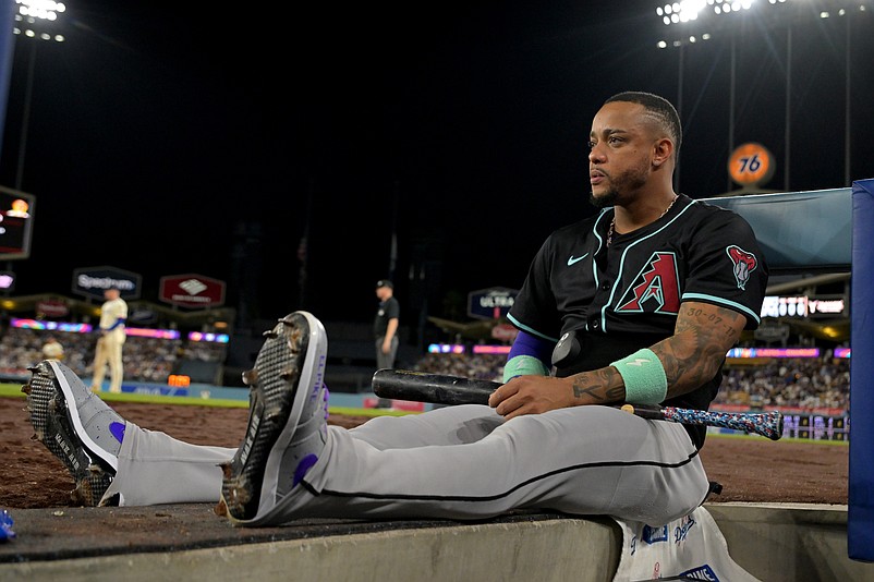 Aug 30, 2025; Los Angeles, California, USA; Arizona Diamondbacks second baseman Ketel Marte (4) looks on from the dugout during the  seventh inning against the Los Angeles Dodgers at Dodger Stadium. Mandatory Credit: Jayne Kamin-Oncea-Imagn Images