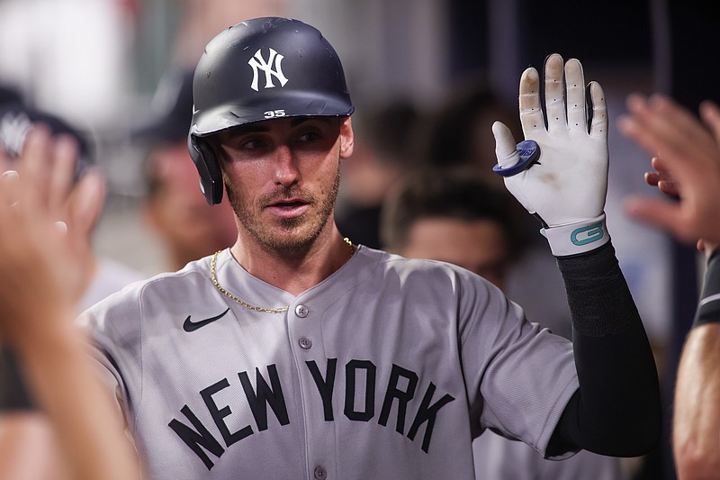 Jul 19, 2025; Atlanta, Georgia, USA; New York Yankees left fielder Cody Bellinger (35) celebrates with teammates after a home run against the Atlanta Braves in the seventh inning at Truist Park. Mandatory Credit: Brett Davis-Imagn Images