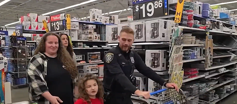 File: footage from a previous year of Shop with a Cop winners. (Credit: Screenshot/NBC 10)