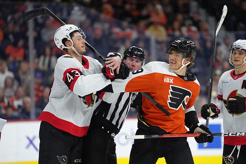 Nov 8, 2025; Philadelphia, Pennsylvania, USA; Ottawa Senators defenseman Tyler Kleven (43) and Philadelphia Flyers right wing Nikita Grebenkin (29) grapple after the whistle in the second period at Xfinity Mobile Arena. Mandatory Credit: Kyle Ross-Imagn Images
