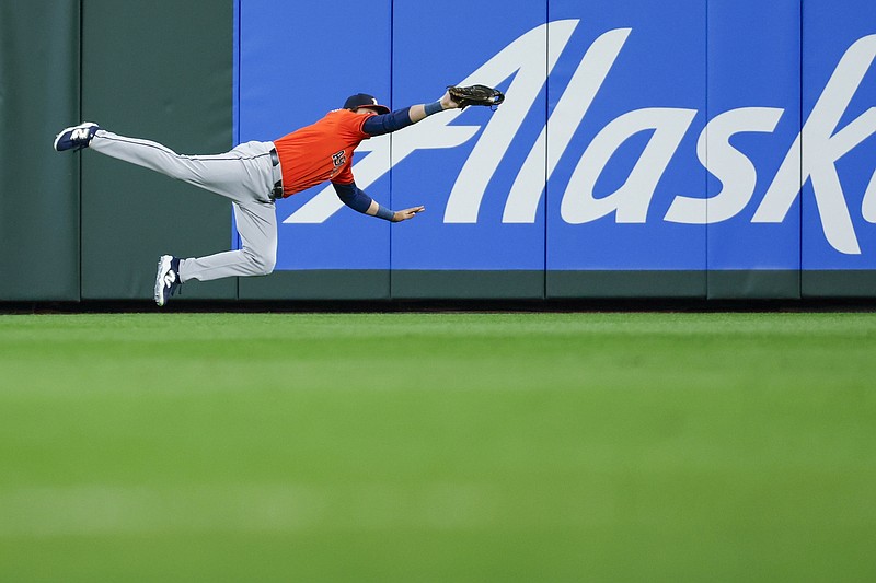 Apr 8, 2025; Seattle, Washington, USA; Houston Astros center fielder Jake Meyers (6) catches a line drive against the Seattle Mariners during the first inning at T-Mobile Park. Mandatory Credit: Joe Nicholson-Imagn Images