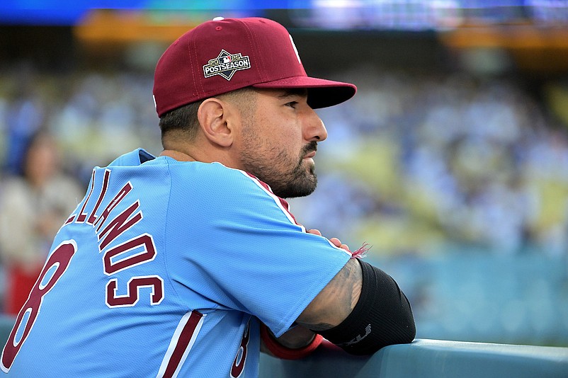 Oct 8, 2025; Los Angeles, California, USA; Philadelphia Phillies right fielder Nick Castellanos (8) looks on from the dugout during game three of the NLDS of the 2025 MLB playoffs against the Los Angeles Dodgers at Dodger Stadium. Mandatory Credit: Jayne Kamin-Oncea-Imagn Images