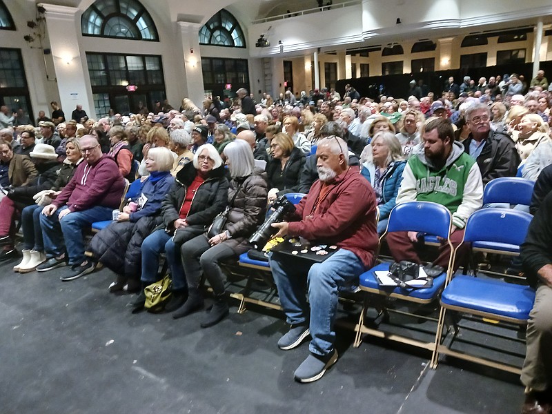 Hundreds of people pack the Music Pier auditorium for the City Council meeting.