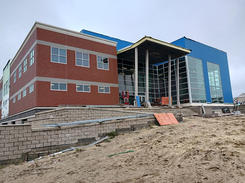 Work continues on the community center's exterior and interior in a final push to get the building completed.