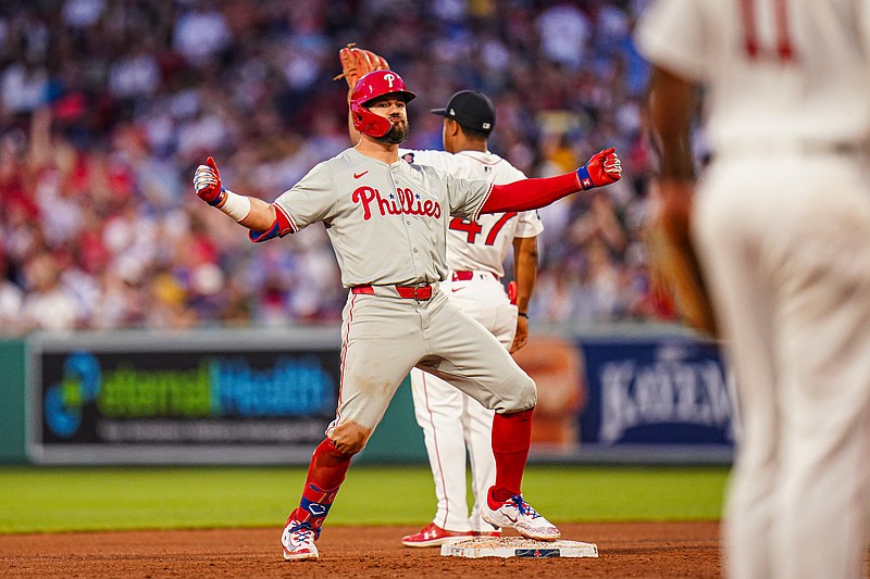 Jun 13, 2024; Boston, Massachusetts, USA; Philadelphia Phillies designated hitter Kyle Schwarber (12) reacts after hitting a double to drive in three runs against the Boston Red Sox in the fourth inning at Fenway Park. Mandatory Credit: David Butler II-USA TODAY Sportso