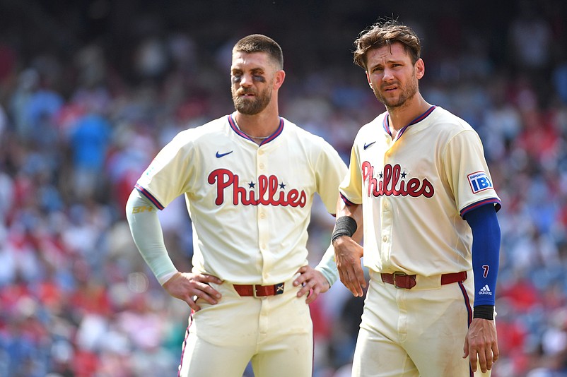 Jul 20, 2025; Philadelphia, Pennsylvania, USA; Philadelphia Phillies first base Bryce Harper (3) and  shortstop Trea Turner (7) against the Los Angeles Angels at Citizens Bank Park. Mandatory Credit: Eric Hartline-Imagn Images