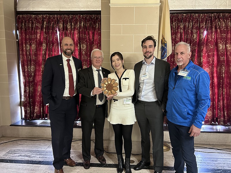 From left, ACUA President Matthew DeNafo, ACUA Board President Marvin Embry, PolyGone Co-Founders Yidian Liu and Nathanial Banks, ACUA Vice President of Wastewater Joseph Pantalone