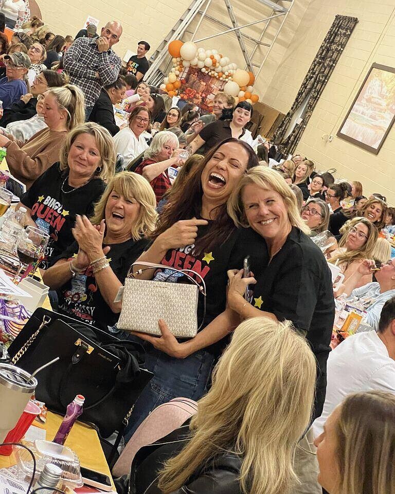 Pictured is one happy winner of a designer handbag at NOVA’s Designer Bag Bingo, held in October at St. Anne’s Ukrainian Catholic Church in Warrington. (Credit: NOVA Bucks County)
