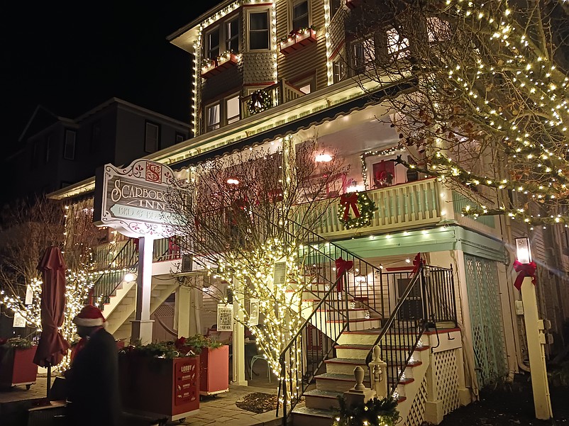 The historic Scarborough Inn, Ocean City's oldest hotel, sparkles in white lights for the tour.