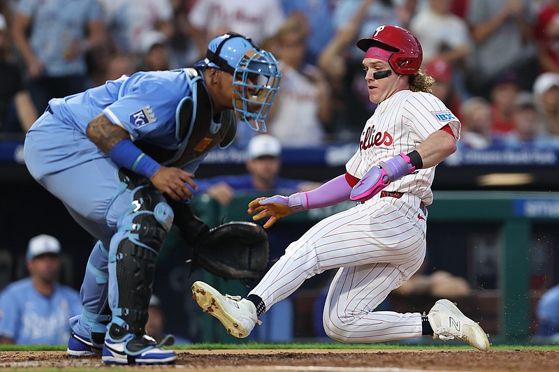 Sep 13, 2025; Philadelphia, Pennsylvania, USA; Philadelphia Phillies outfielder Harrison Bader (2) slides past the tag attempt of Kansas City Royals catcher Salvador Perez (13) for a run during the third inning at Citizens Bank Park. Mandatory Credit: Bill Streicher-Imagn Images