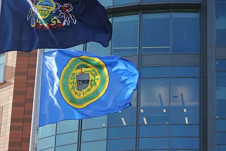 The Bucks County flag waving in the wind. File photo (Credit: Tom Sofield/LevittownNow.com)