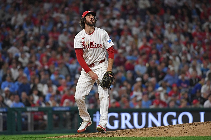 Aug 18, 2025; Philadelphia, Pennsylvania, USA;  Philadelphia Phillies pitcher Jordan Romano (68) watches a home run during the seventh inning against the Seattle Mariners at Citizens Bank Park. Mandatory Credit: Eric Hartline-Imagn Images