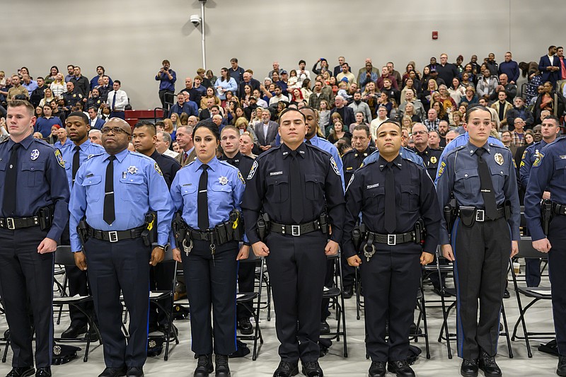 Graduating Montgomery County Community College Municipal Police Academy cadets stand at attention during the program’s Dec. 10 graduation ceremony. Thirty-seven new officers completed the program. Photo by Linda Johnson