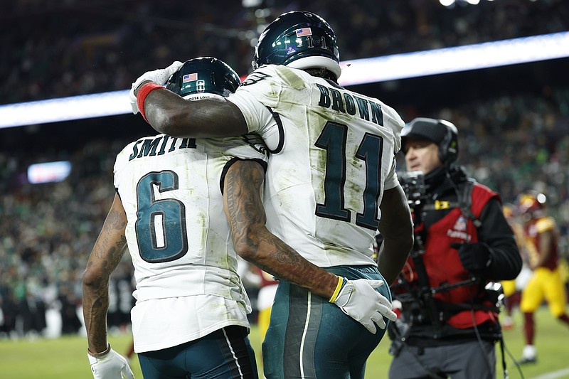 Dec 20, 2025; Landover, Maryland, USA; Philadelphia Eagles wide receiver Devonta Smith (6) celebrates with wide receiver A.J. Brown (11) after making a catch for a touchdown against the Washington Commanders in the first half at Northwest Stadium. Mandatory Credit: Geoff Burke-Imagn Images