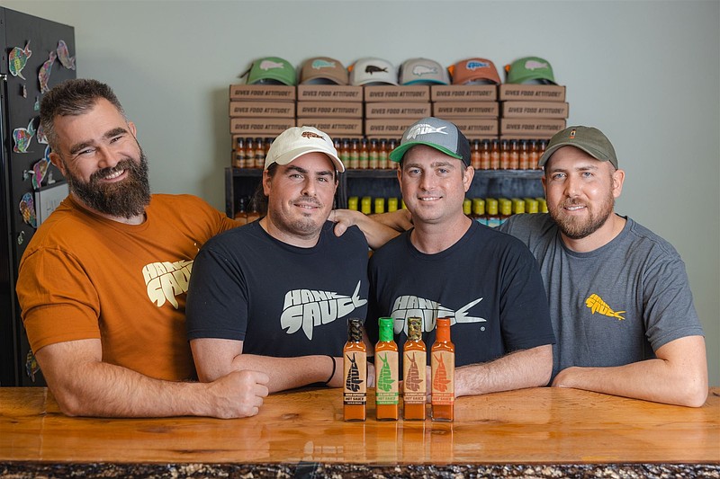 Jason Kelce, left, joins with Hank Sauce co-founders Matt Pittaluga, Brian “Hank” Ruxton and Josh Jaspan. (Courtesy of Hank Sauce)