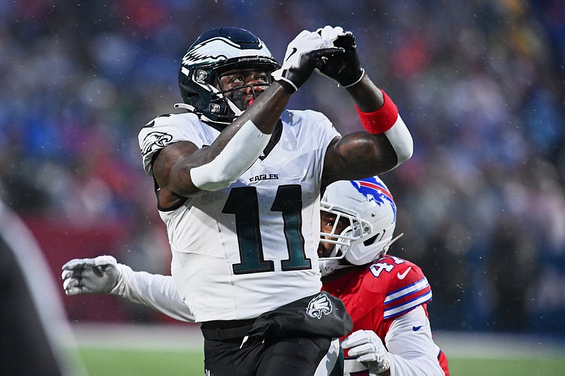 Dec 28, 2025; Orchard Park, New York, USA; Philadelphia Eagles wide receiver A.J. Brown (11) prepares to catch a pass against Buffalo Bills cornerback Christian Benford (47) during the first quarter at Highmark Stadium. Mandatory Credit: Mark Konezny-Imagn Images