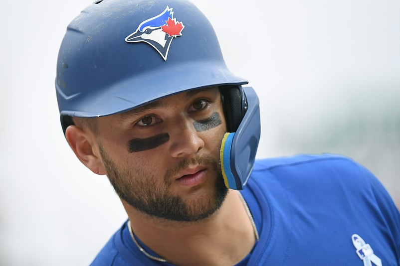 Jun 15, 2025; Philadelphia, Pennsylvania, USA; Toronto Blue Jays shortstop Bo Bichette (11) on deck against the Philadelphia Phillies at Citizens Bank Park. Mandatory Credit: Eric Hartline-Imagn Images