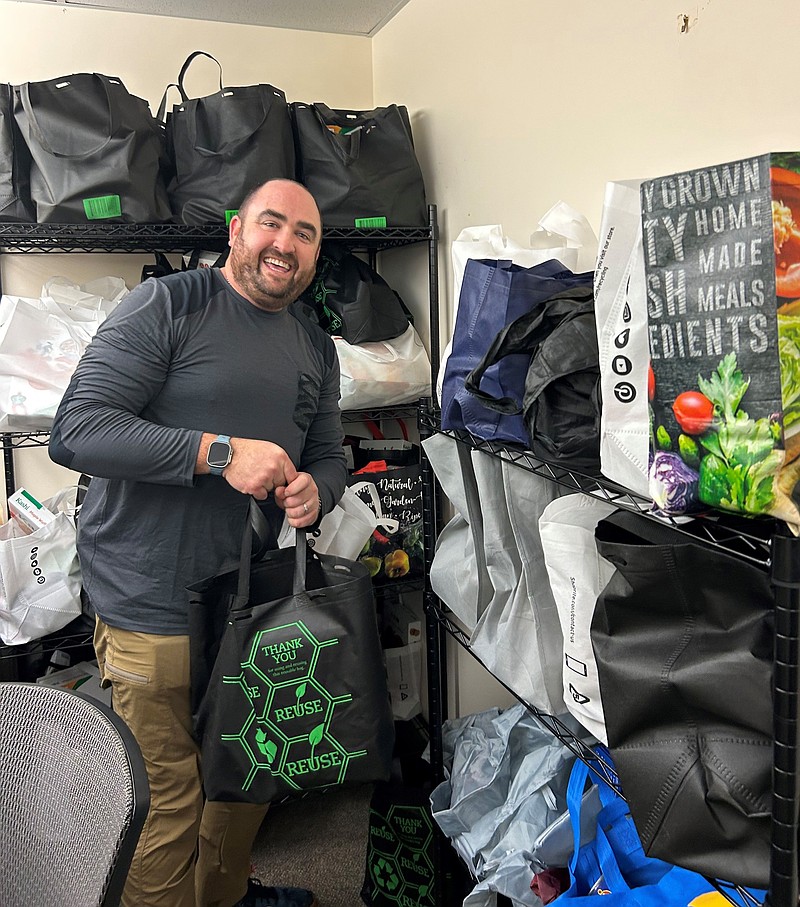 JFS/JFS Board Treasurer Aaron Sykes prepares food bags for people in need during the Martin Luther King, Jr. Day of Service in 2025.