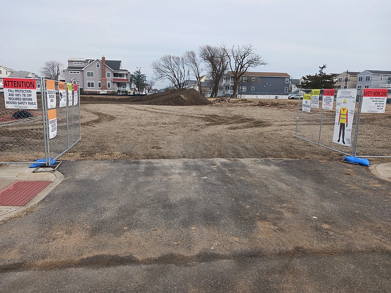 The entrance to the housing construction site is on Fourth Street.