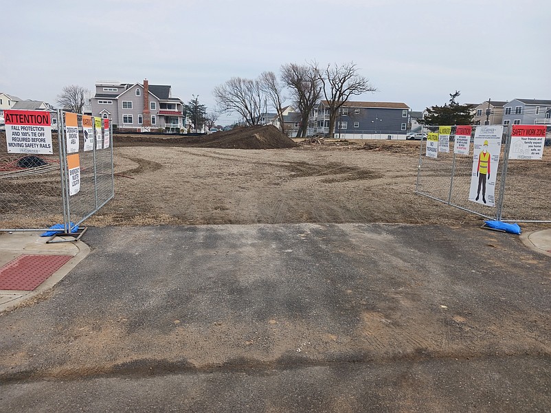 The entrance to the housing construction site is on Fourth Street.