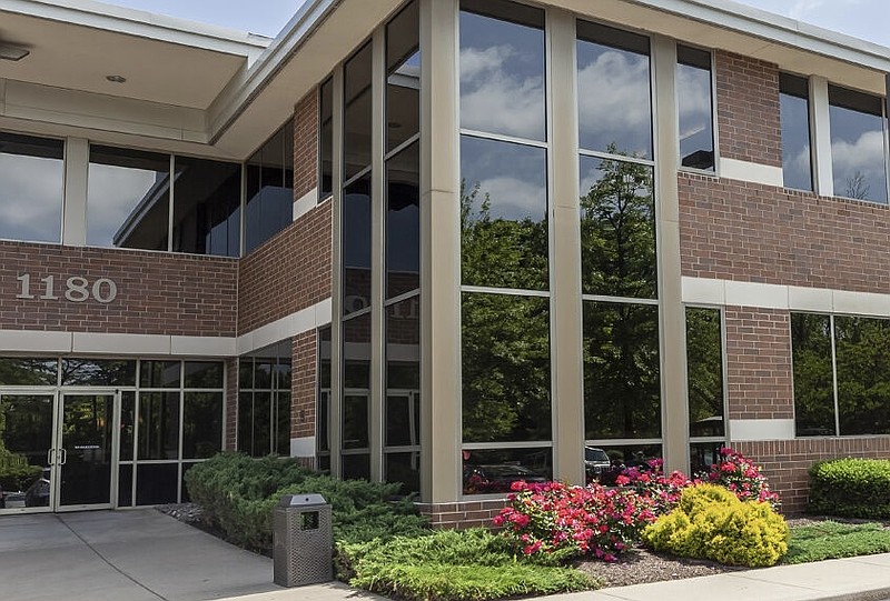 The Jaisohn Community Wellness Plaza, showing the main building corner and landscaped entrance. Warm, inviting, and welcoming to the community.