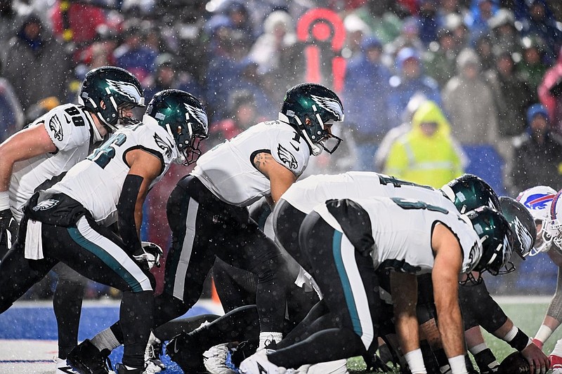 Dec 28, 2025; Orchard Park, New York, USA; Philadelphia Eagles quarterback Jalen Hurts (1) lines up for a quarterback sneak play against the Buffalo Bills during the fourth quarter at Highmark Stadium. Mandatory Credit: Mark Konezny-Imagn Images