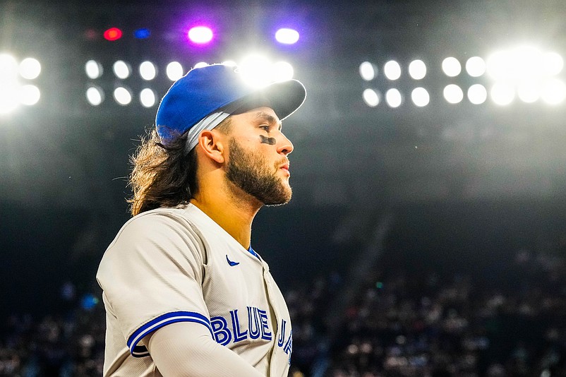 Jun 29, 2024; Toronto, Ontario, CAN; Toronto Blue Jays shortstop Bo Bichette (11) returns to the dugout before playing the New York Yankees at Rogers Centre. Mandatory Credit: Kevin Sousa-USA TODAY Sports