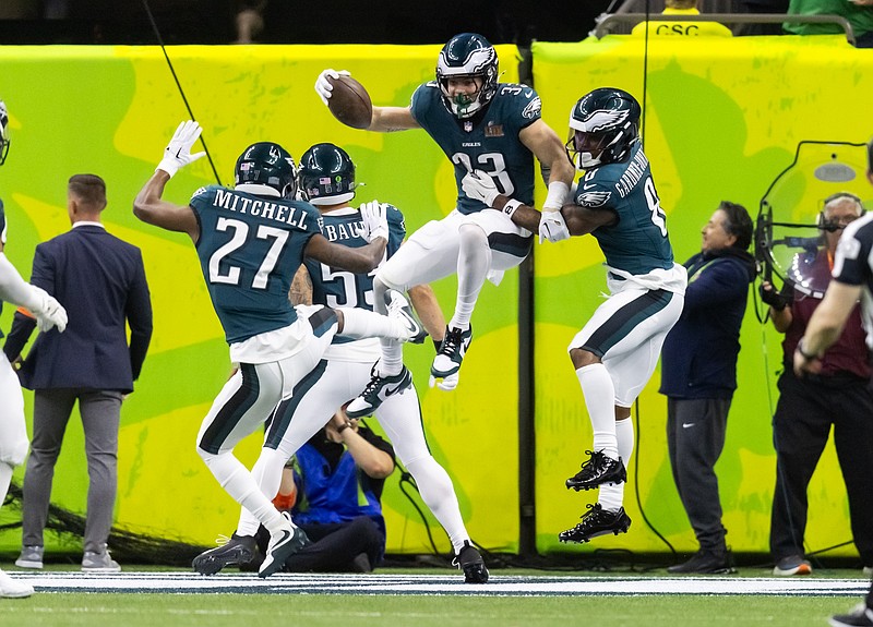 Feb 9, 2025; New Orleans, LA, USA; Philadelphia Eagles cornerback Cooper DeJean (33) celebrates with Quinyon Mitchell (27) and C.J. Gardner-Johnson (8) after returning an interception for a touchdown against the Kansas City Chiefs in the second quarter in Super Bowl LIX at Ceasars Superdome. Mandatory Credit: Mark J. Rebilas-Imagn Images