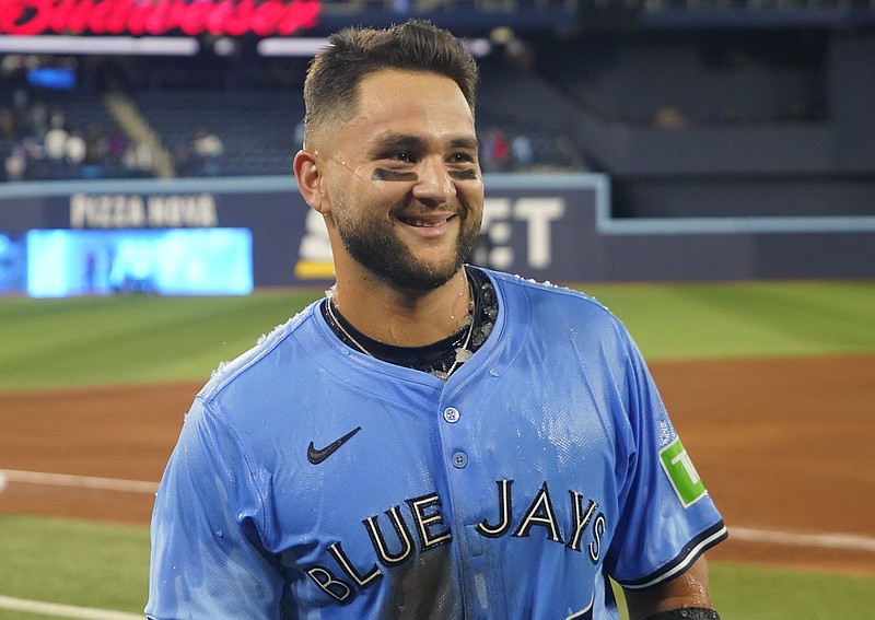 Apr 1, 2025; Toronto, Ontario, CAN; Toronto Blue Jays shortstop Bo Bichette (11) reacts after a win over the Washington Nationals  at Rogers Centre. Mandatory Credit: John E. Sokolowski-Imagn Images