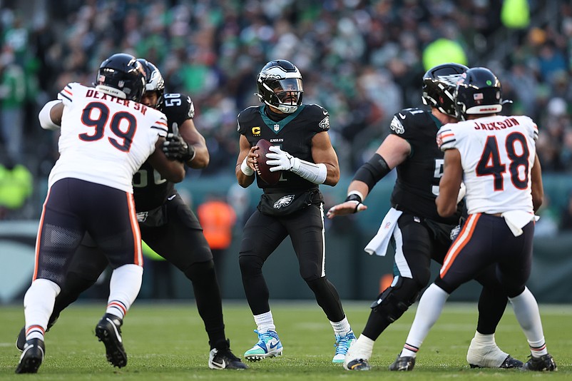 Nov 28, 2025; Philadelphia, Pennsylvania, USA; Philadelphia Eagles quarterback Jalen Hurts (1) looks to pass the ball against the Chicago Bears during the second quarter of the game at Lincoln Financial Field. Mandatory Credit: Bill Streicher-Imagn Images