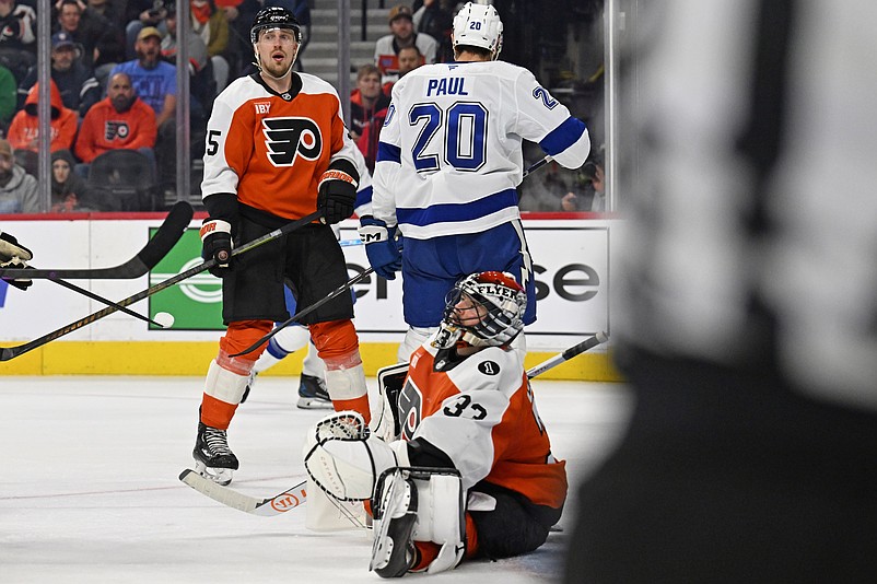 Jan 10, 2026; Philadelphia, Pennsylvania, USA; Philadelphia Flyers goaltender Samuel Ersson (33) reacts after allowing goal by Tampa Bay Lightning left wing Nick Paul (20) during the second period at Xfinity Mobile Arena. Mandatory Credit: Eric Hartline-Imagn Images