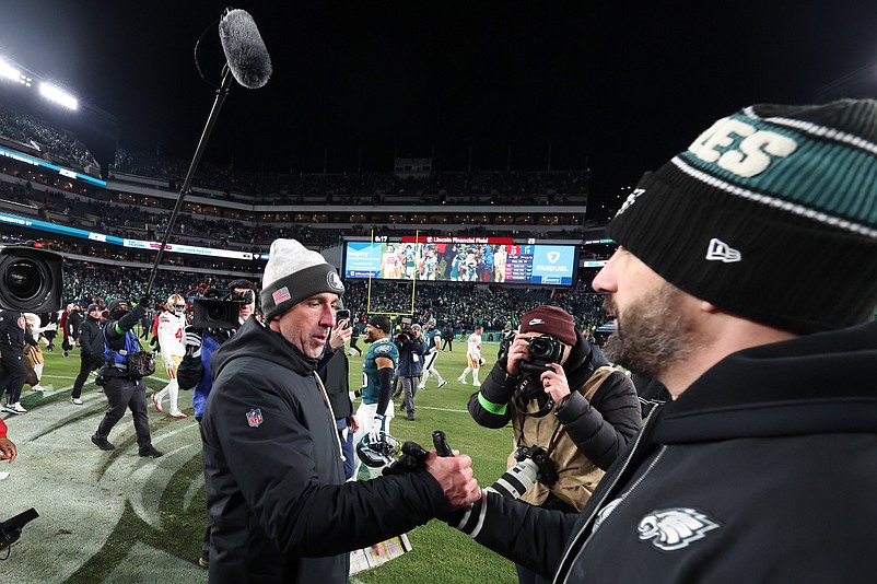 Jan 11, 2026; Philadelphia, PA, USA; San Francisco 49ers head coach Kyle Shanahan shakes hands with Philadelphia Eagles head coach Nick Sirianni after an NFC Wild Card Round game at Lincoln Financial Field. Mandatory Credit: Bill Streicher-Imagn Images