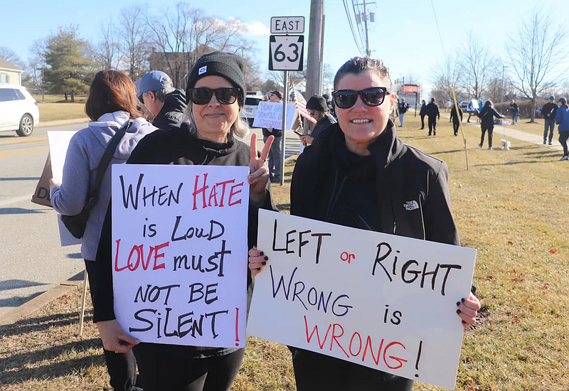 Shannon Heacock (right) rallies with her sister (left).