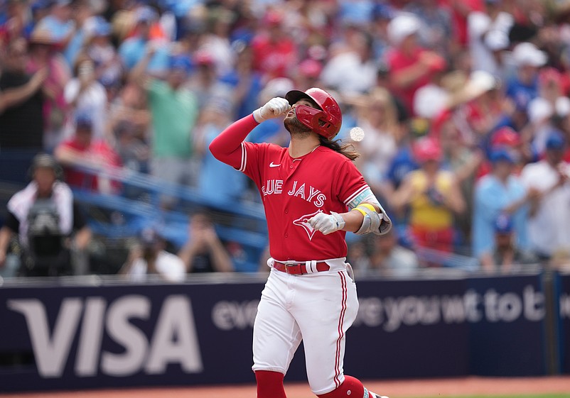 Jul 1, 2023; Toronto, Ontario, CAN; Toronto Blue Jays shortstop Bo Bichette (11) celebrates hitting a home run against the Boston Red Sox during the third inning at Rogers Centre. Mandatory Credit: Nick Turchiaro-USA TODAY Sports