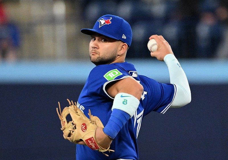 May 21, 2025; Toronto, Ontario, CAN;  Toronto Blue Jays shortstop Bo Bichette (11) warms up before playing the San Diego Padres at Rogers Centre. Mandatory Credit: Dan Hamilton-Imagn Images