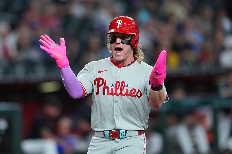 Sep 20, 2025; Phoenix, Arizona, USA; Philadelphia Phillies outfielder Harrison Bader (2) scores a run against the Arizona Diamondbacks during the first inning at Chase Field. Mandatory Credit: Joe Camporeale-Imagn Images