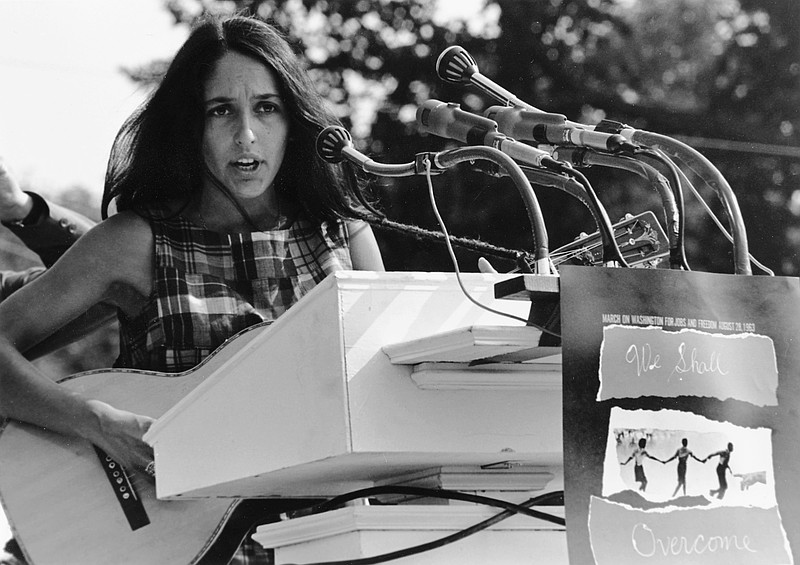 Joan Baez playing at the March on Washington in August 1963. Photo by Rowland Scherman, U.S. Information Agency