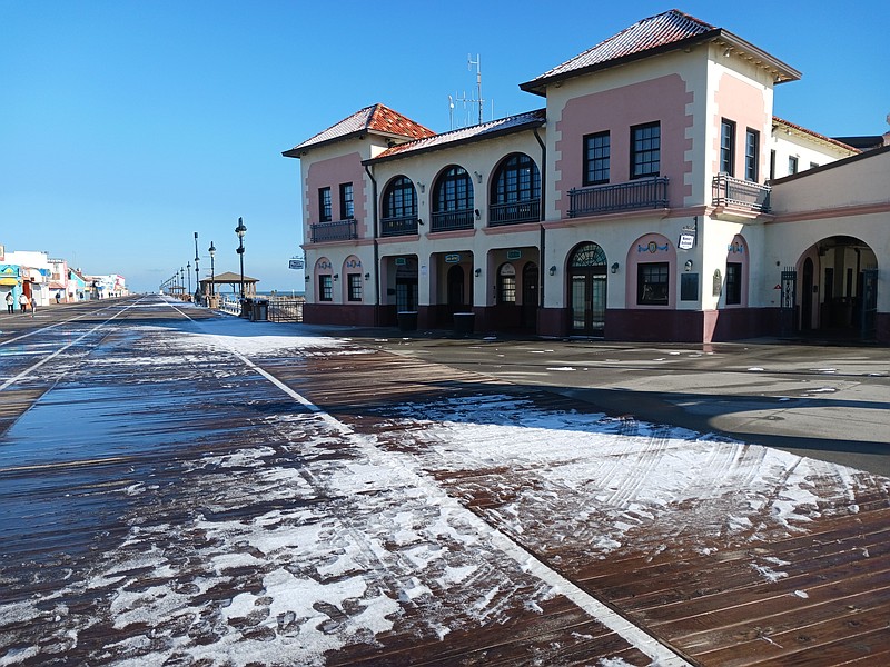 A slight dusting of snow coats a section of the Ocean City Boardwalk in front of the Music Pier. A lot more snow could be coming this weekend.