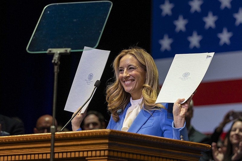 Mikie Sherrill signs her first executive order during her inauguration at NJPAC in Newark, Tuesday, Jan. 20, 2026. (Photo by Anne-Marie Caruso/New Jersey Monitor)
