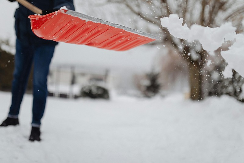 A resident shoveling snow (Credit: Karolina Grabowska/Pexels)