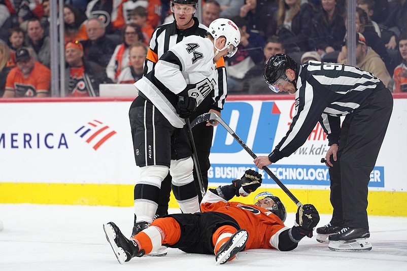Jan 31, 2026; Philadelphia, Pennsylvania, USA; Philadelphia Flyers right wing Travis Konecny (11) reacts against Los Angeles Kings defenseman Mikey Anderson (44) in the second period at Xfinity Mobile Arena. Mandatory Credit: Kyle Ross-Imagn Images