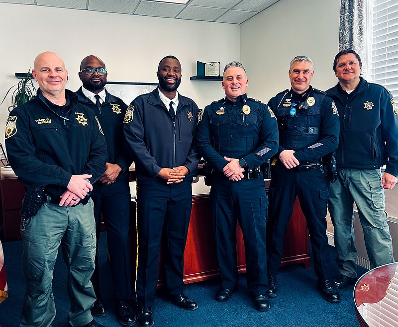 The Delaware County Sheriff, center, met with Media Borough Police this week. (Image courtesy of the Sheriff's Office)