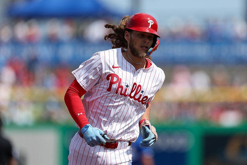 Mar 8, 2025; Clearwater, Florida, USA; Philadelphia Phillies third baseman Alec Bohm (28) runs the bases after hitting a solo home run against the Toronto Blue Jays in the third inning during spring training at BayCare Ballpark. Mandatory Credit: Nathan Ray Seebeck-Imagn Images