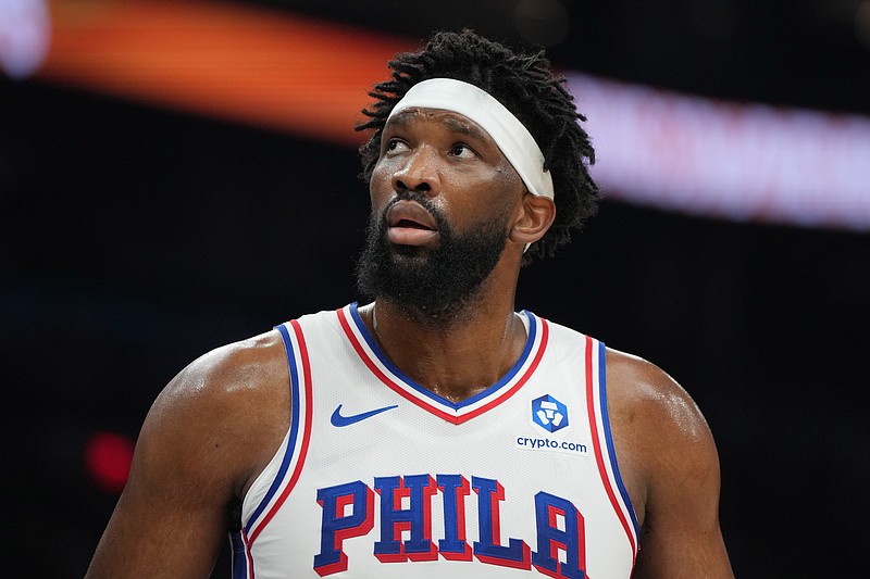 Feb 7, 2026; Phoenix, Arizona, USA; Philadelphia 76ers center Joel Embiid (21) reacts against the Phoenix Suns during the first half of an NBA game at Mortgage Matchup Center. Mandatory Credit: Rick Scuteri-Imagn Images